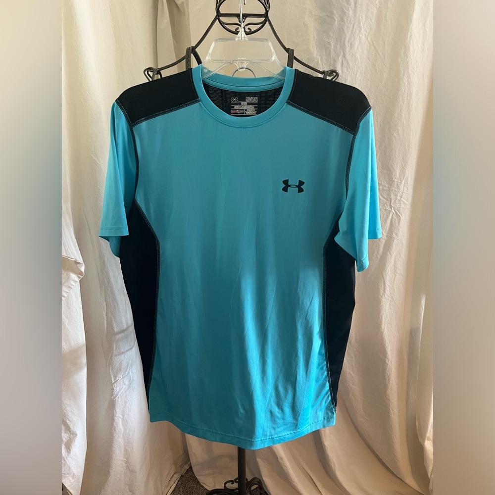 Blue under armor athletic shirt and shorts outfit. Medium size